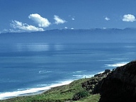 Hinter der Te Waewae Bay ragen die Sdalpen steil auf.